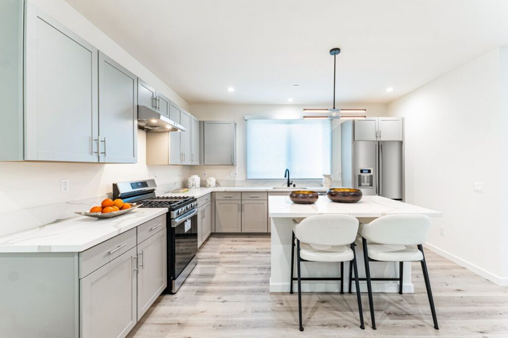 Bright and spacious contemporary kitchen with minimalist style and luxury features.